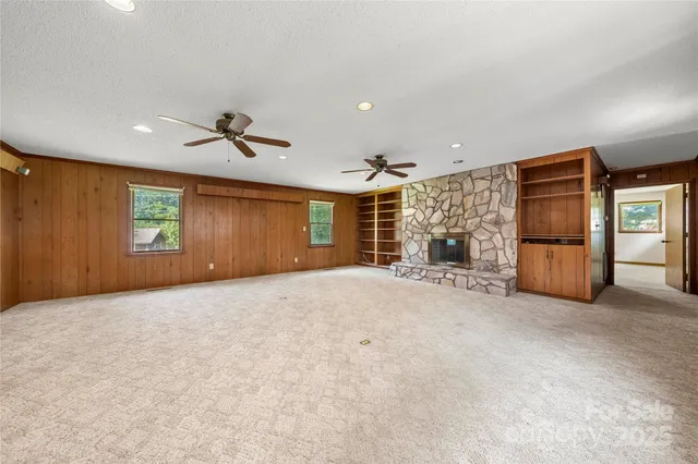 a view of a livingroom with furniture and closet