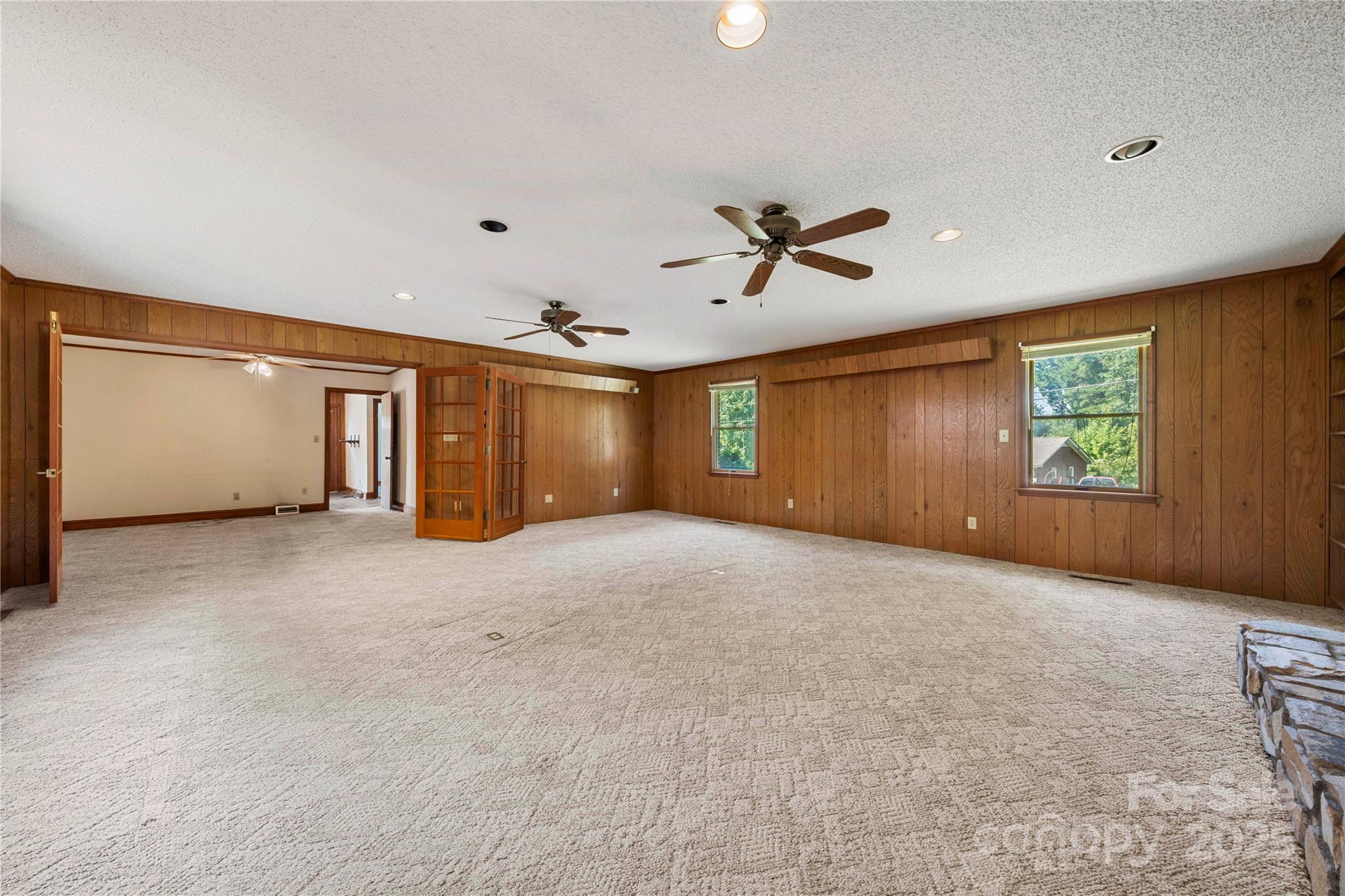 505 Rogers Lake Road East Kannapolis, NC 28083 - Photo 19 of 33 a view of a livingroom with a ceiling fan and window