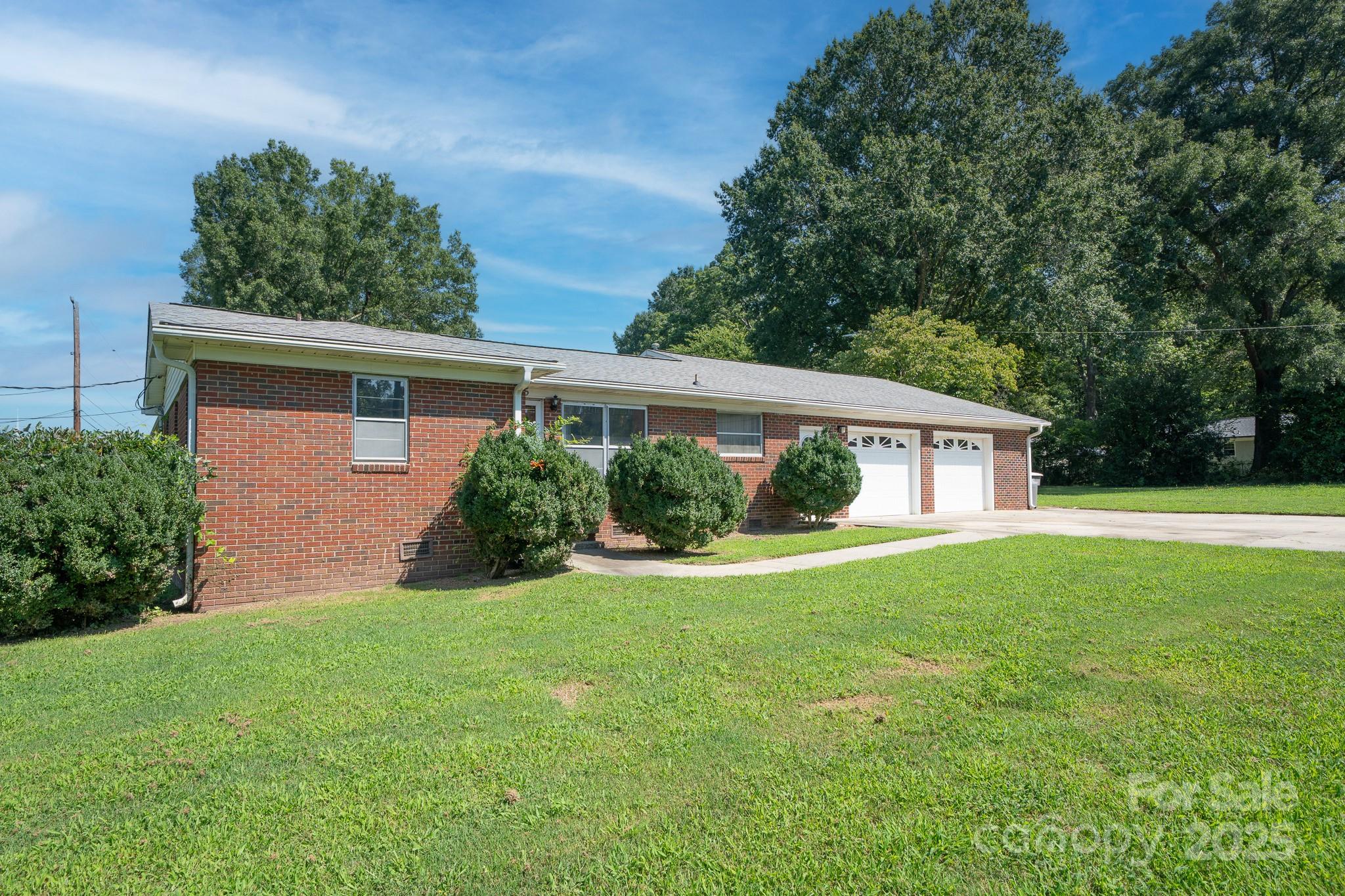 505 Rogers Lake Road East Kannapolis, NC 28083 - Photo 2 of 33 a view of a house with a yard and potted plants