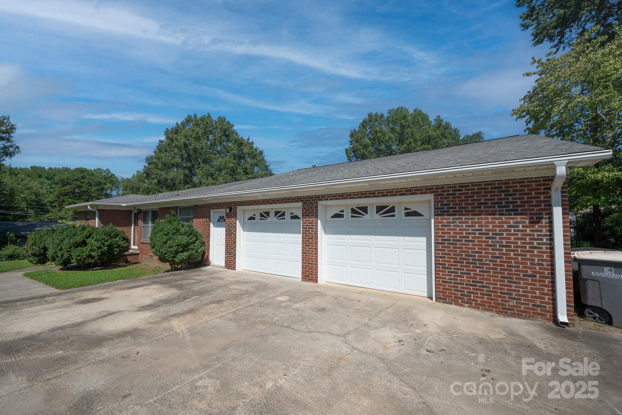 505 Rogers Lake Road East Kannapolis, NC 28083 - Photo 4 of 33 front view of a house with a yard and garage