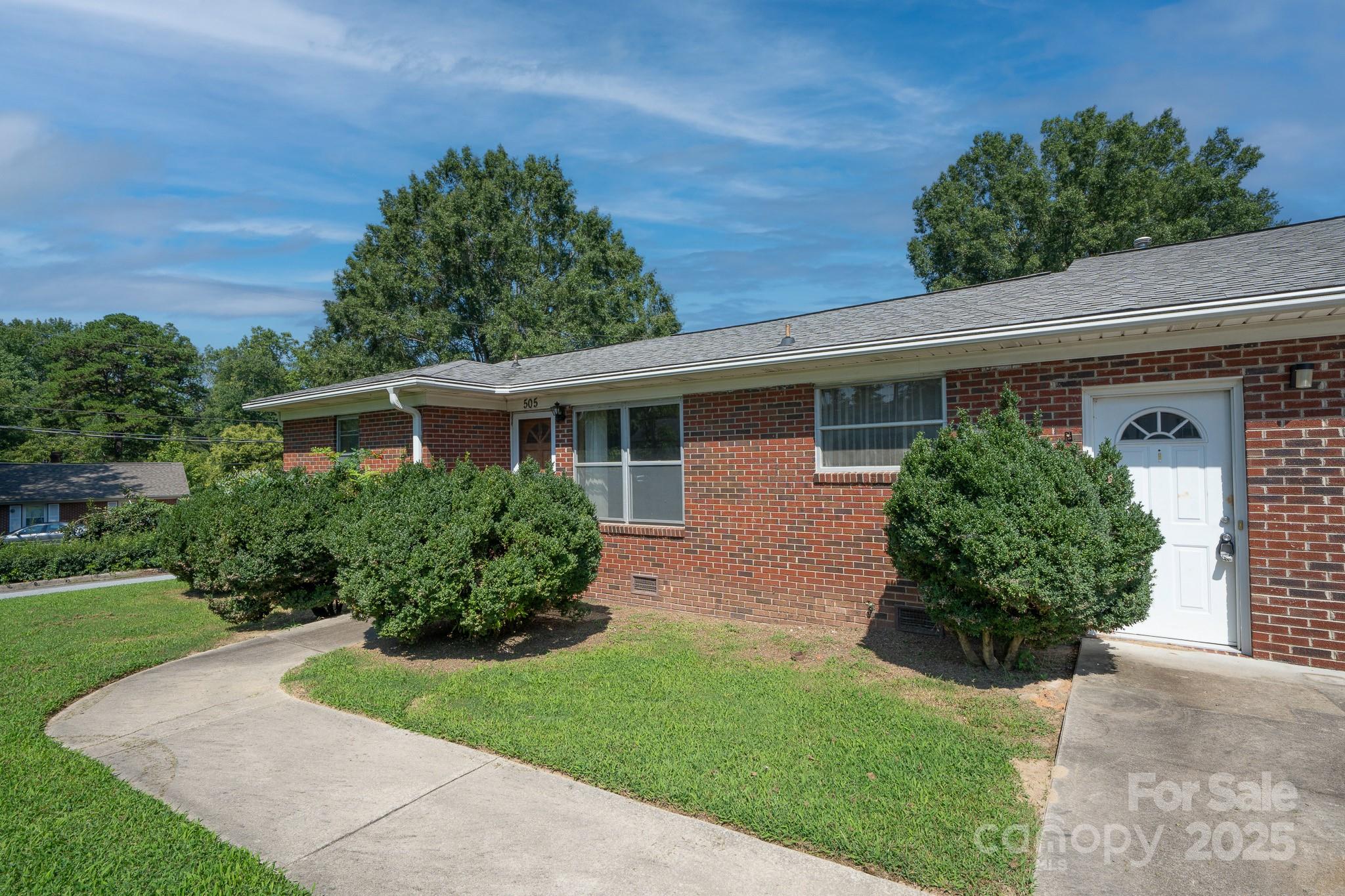505 Rogers Lake Road East Kannapolis, NC 28083 - Photo 5 of 33 front view of a house with a yard