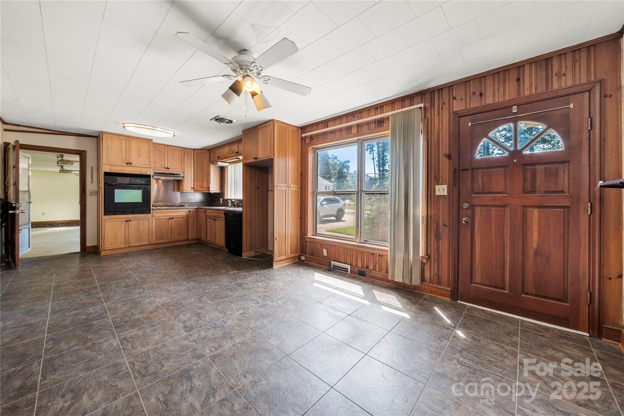 505 Rogers Lake Road East Kannapolis, NC 28083 - Photo 7 of 33 a view of a livingroom with furniture and chandelier fan