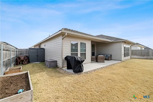 a house view with a outdoor space