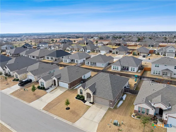an aerial view of a residential houses