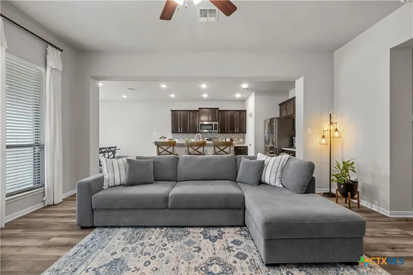 a living room with furniture and a couch