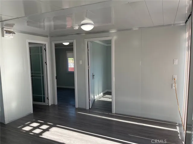 a view of livingroom with furniture and wooden floor