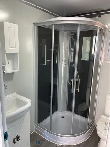 a bathroom with a sink and toilet