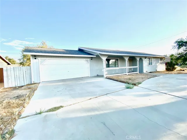 a front view of a house with a garage