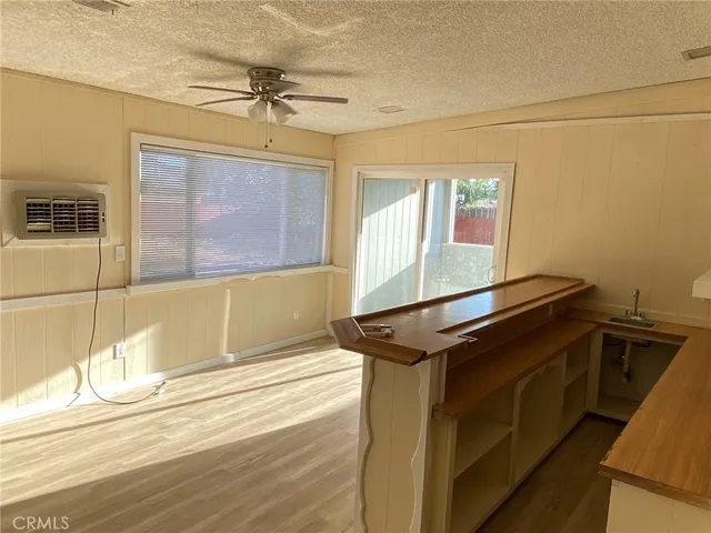 a room with a window and a table