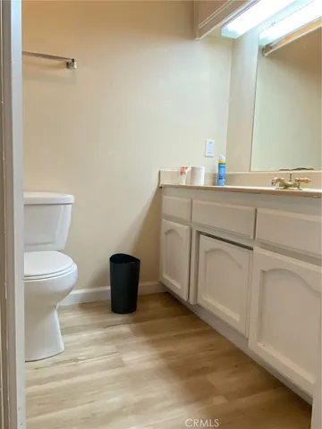 a bathroom with a toilet and a sink