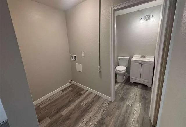 a view of a room with a washer and dryer