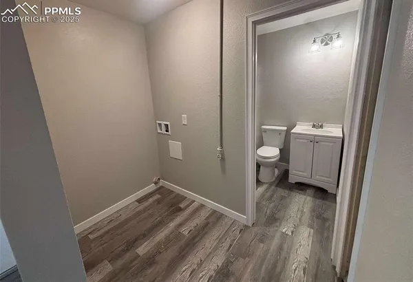 a view of a room with a washer and dryer