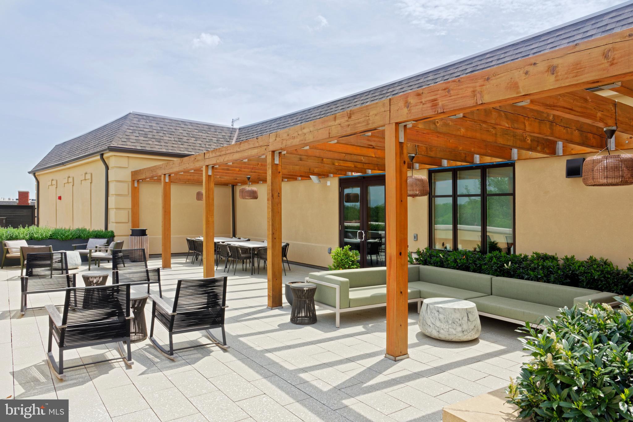 8551 Connecticut Avenue, Unit 207 Chevy Chase, MD 20815 - Photo 26 of 33 a outdoor space with patio the couches and chairs