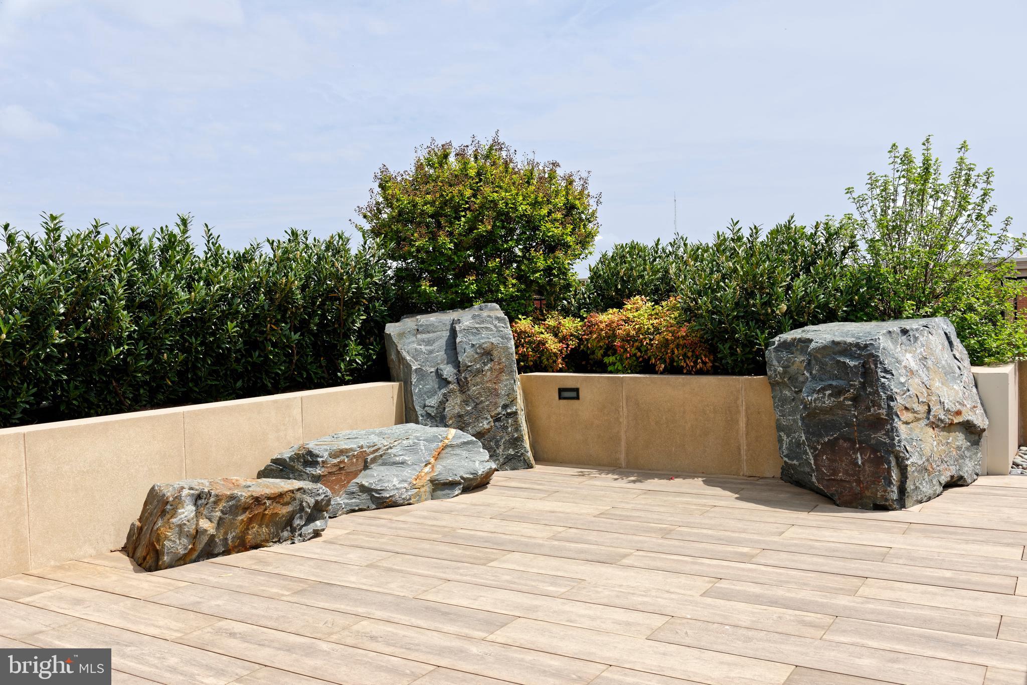 8551 Connecticut Avenue, Unit 207 Chevy Chase, MD 20815 - Photo 30 of 33 a wooden bench sitting on top of a wooden floor