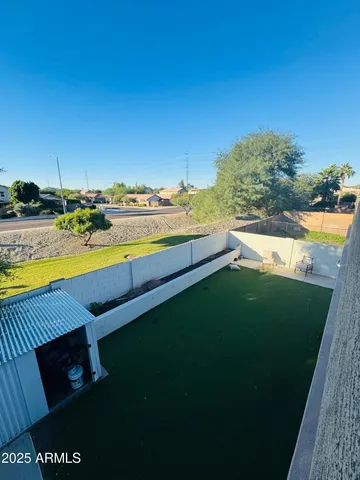 a view of an outdoor space and swimming pool