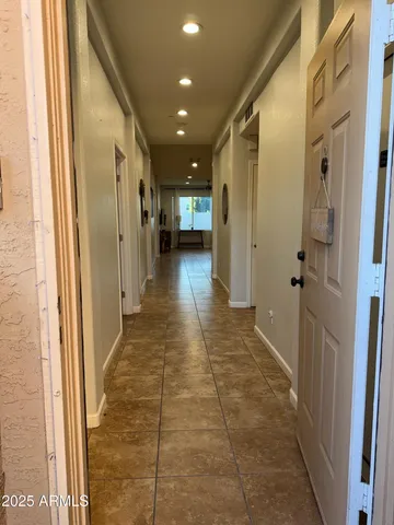 a bathroom with a glass door shower