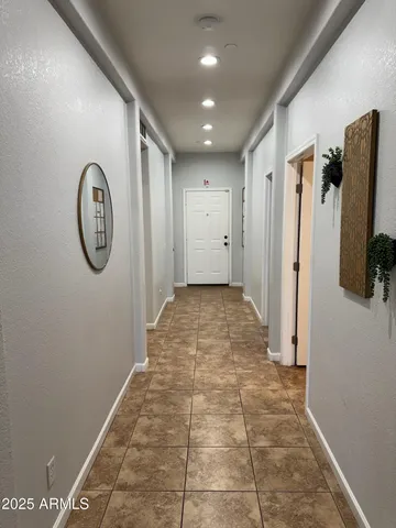 a view of a hallway with elevator
