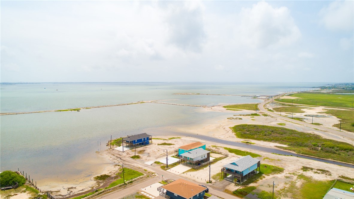 121 Knickerbocker Street Corpus Christi, TX 78418 - Photo 5 of 5 a view of a swimming pool and an ocean view