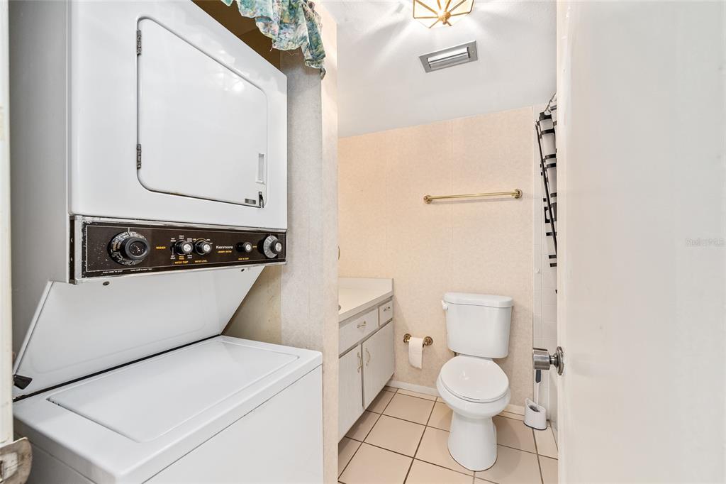 606 Midway Drive, Unit A Ocala, FL 34472 - Photo 20 of 27 a bathroom with a toilet a sink and a mirror