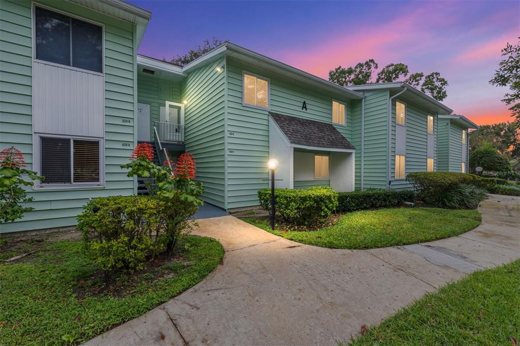 606 Midway Drive, Unit A Ocala, FL 34472 - Photo 27 of 27 a front view of a house with a yard