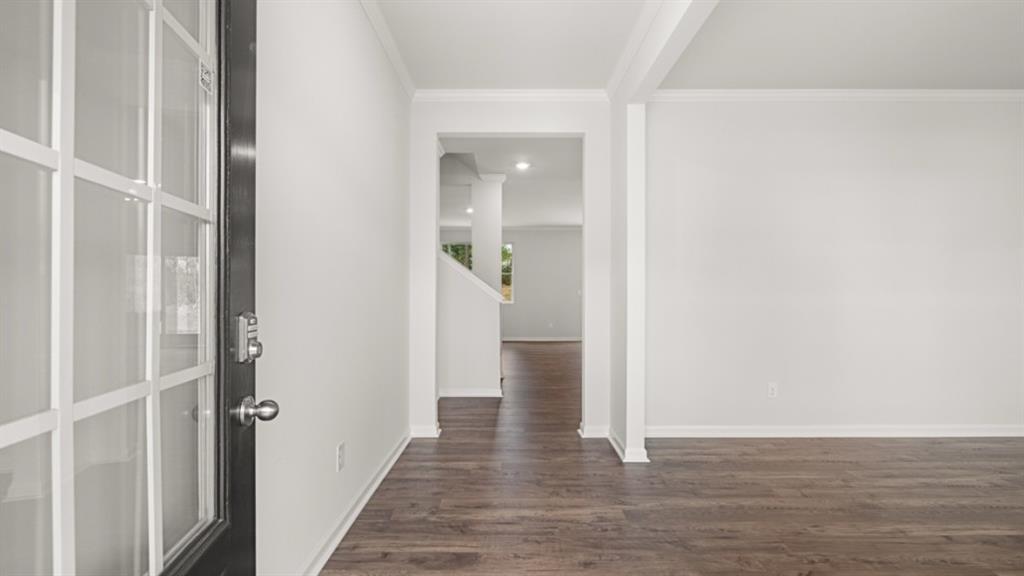 348 Belmont Drive Cartersville, GA 30120 - Photo 2 of 41 a view of a hallway with wooden floor