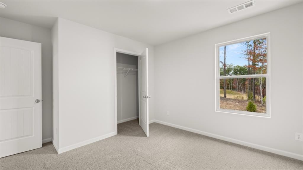 348 Belmont Drive Cartersville, GA 30120 - Photo 26 of 41 a view of an empty room with a window
