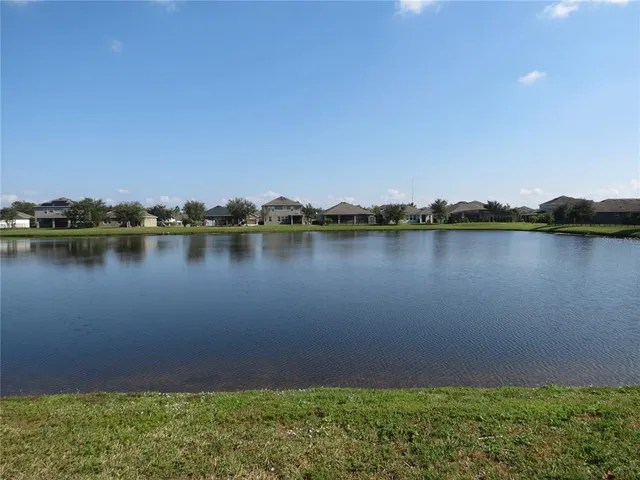 a view of an ocean with a houses