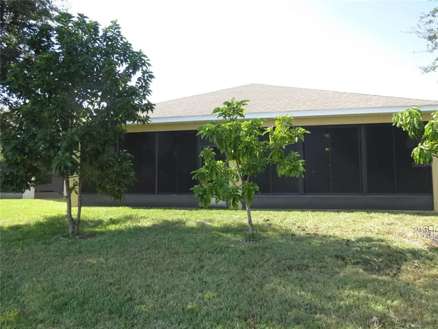 a view of a garden with a tree