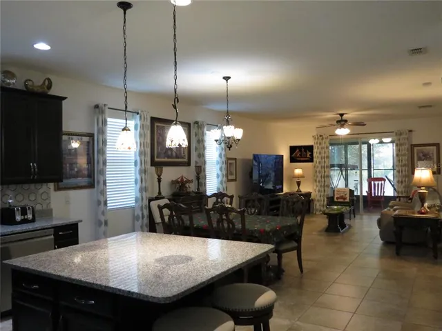 a kitchen with counter space cabinets and appliances