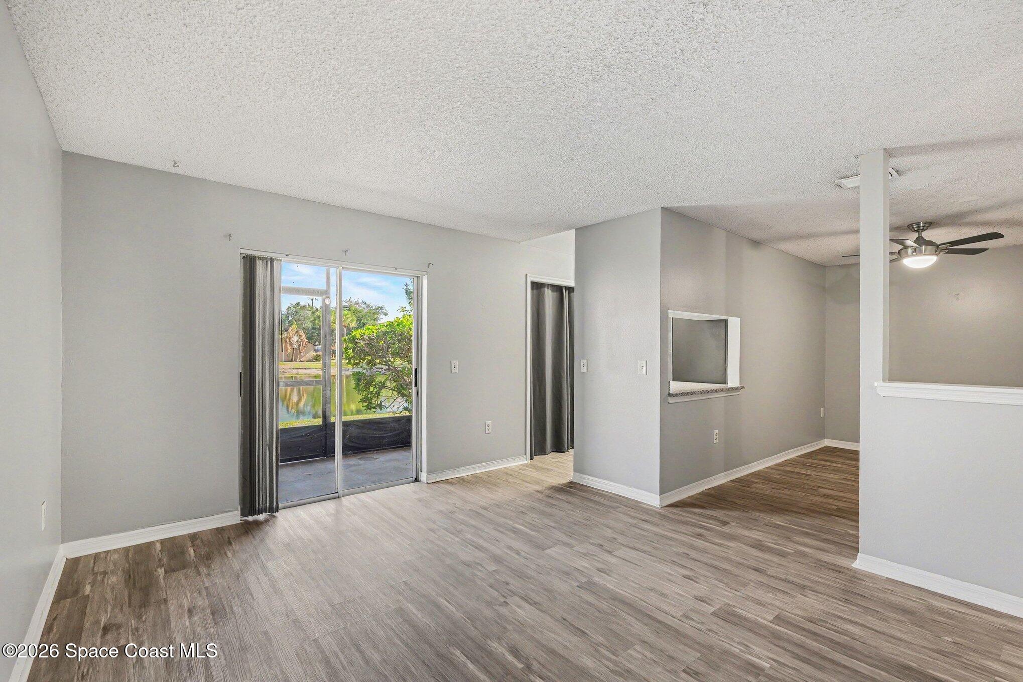 240 Spring Drive, Unit 2 Merritt Island, FL 32953 - Photo 3 of 16 003_file_2661