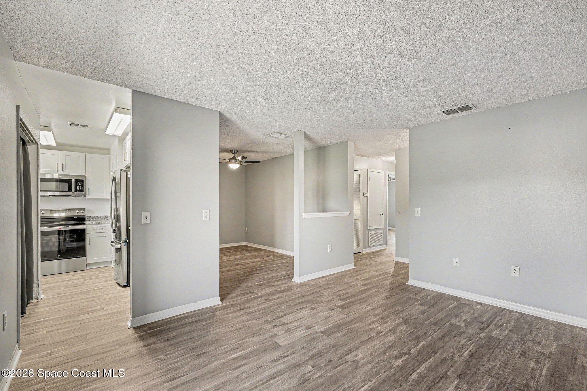 240 Spring Drive, Unit 2 Merritt Island, FL 32953 - Photo 5 of 16 005_file_1869