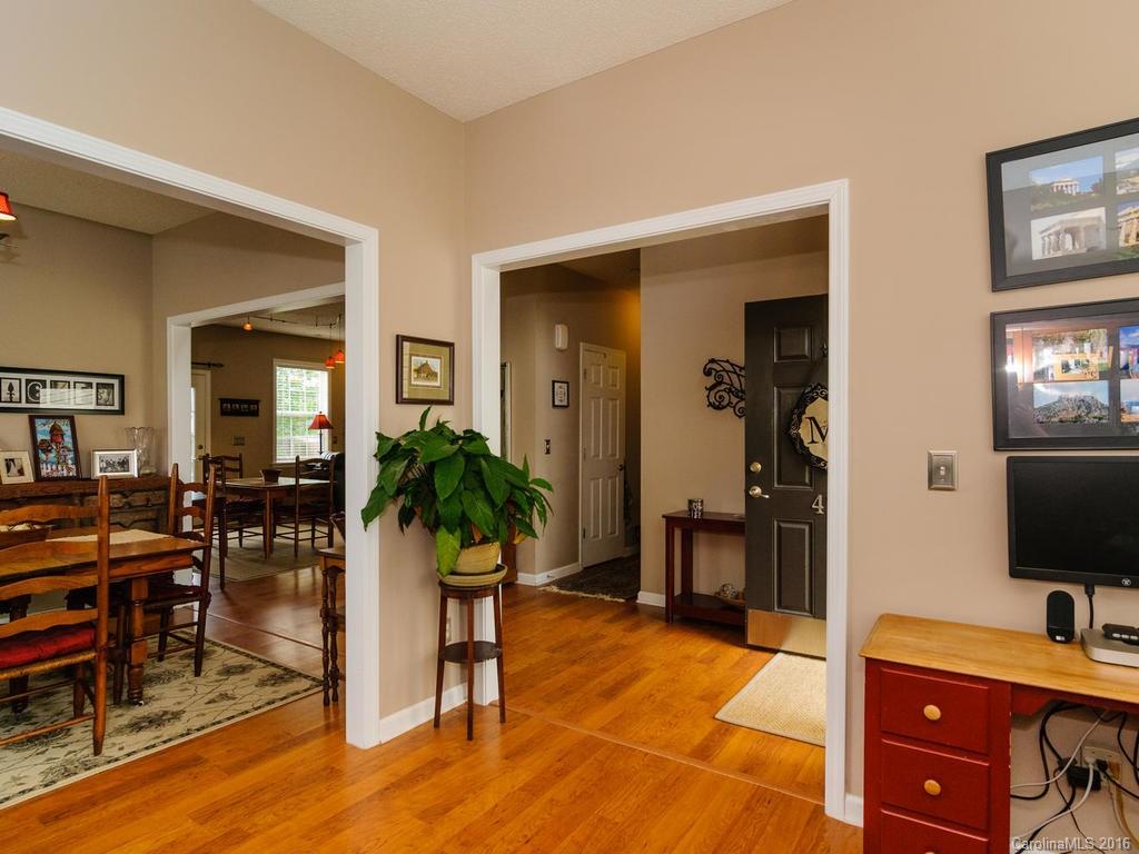 47 Lumber River Road, Unit 183 Fletcher, NC 28732 - Photo 14 of 24 a living room with furniture and a flat screen tv