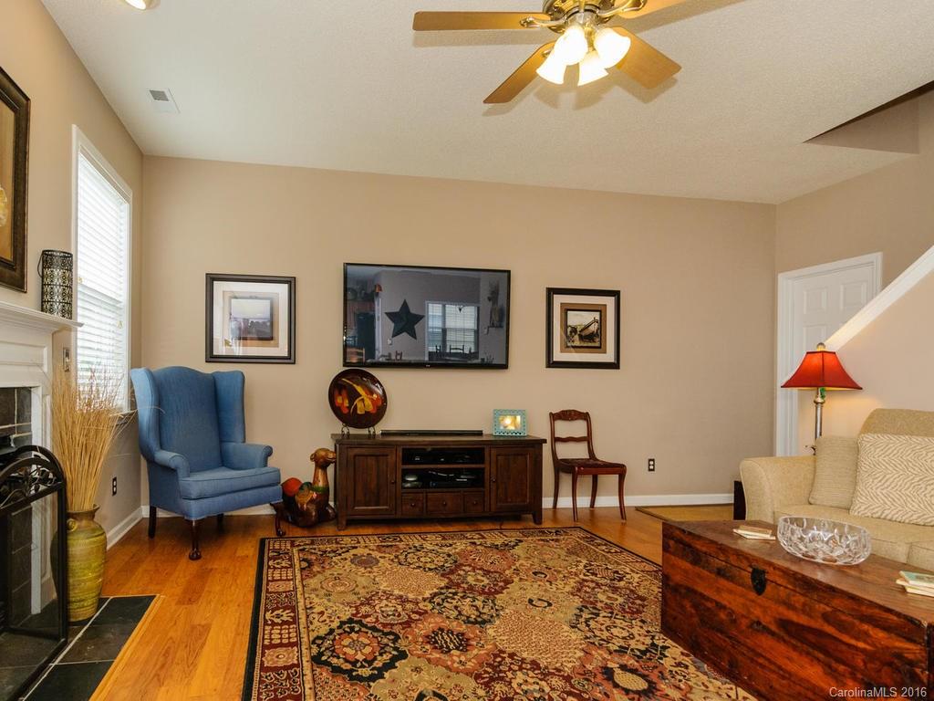 47 Lumber River Road, Unit 183 Fletcher, NC 28732 - Photo 4 of 24 a living room with furniture and a flat screen tv