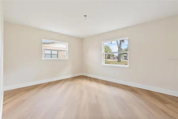 an empty room with windows