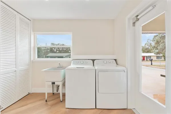 a utility room with dryer and washer