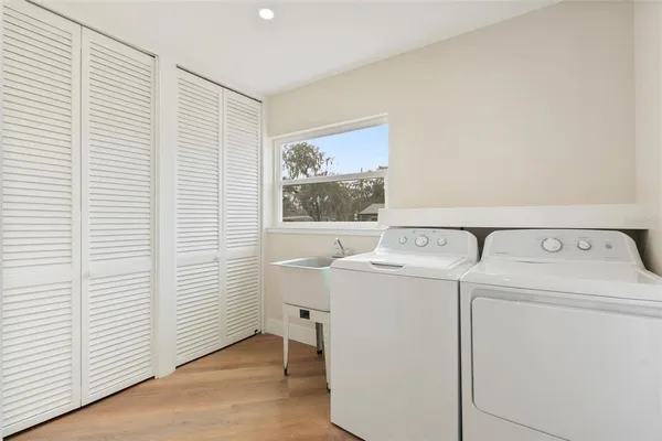 a utility room with dryer and washer