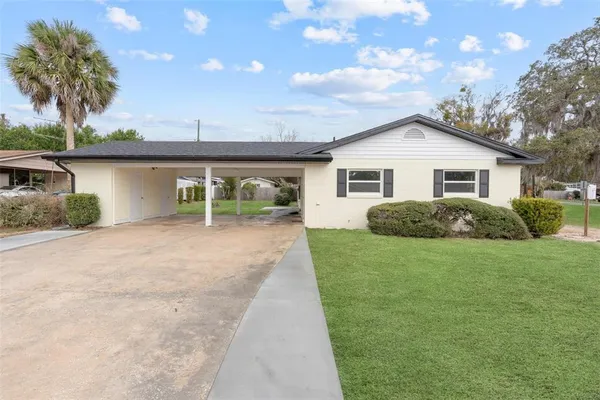 a house view with a garden space