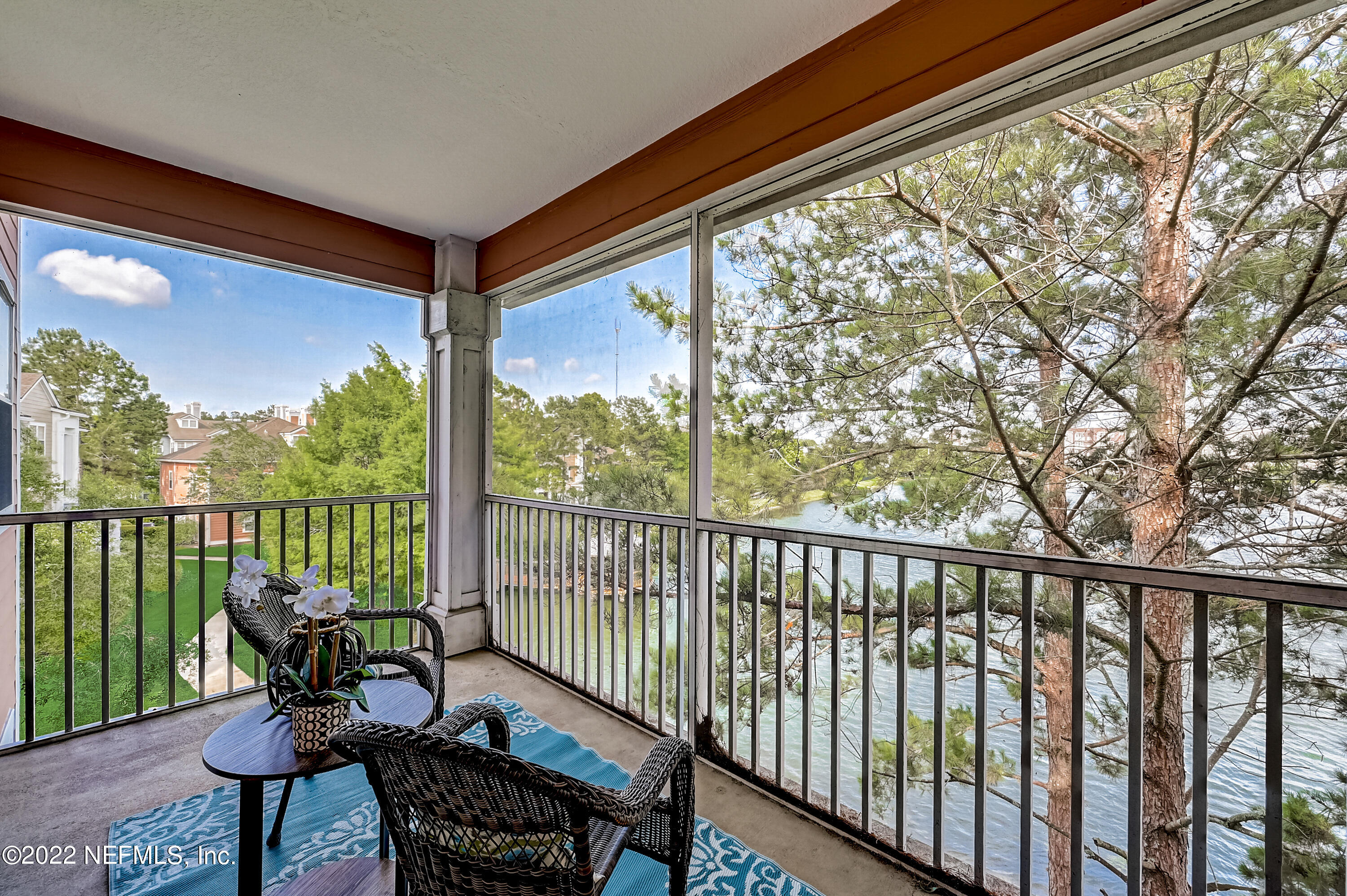8550 Touchton Road, Unit 1132 Jacksonville, FL 32216 - Photo 20 of 43 a view of a chair in wooden deck