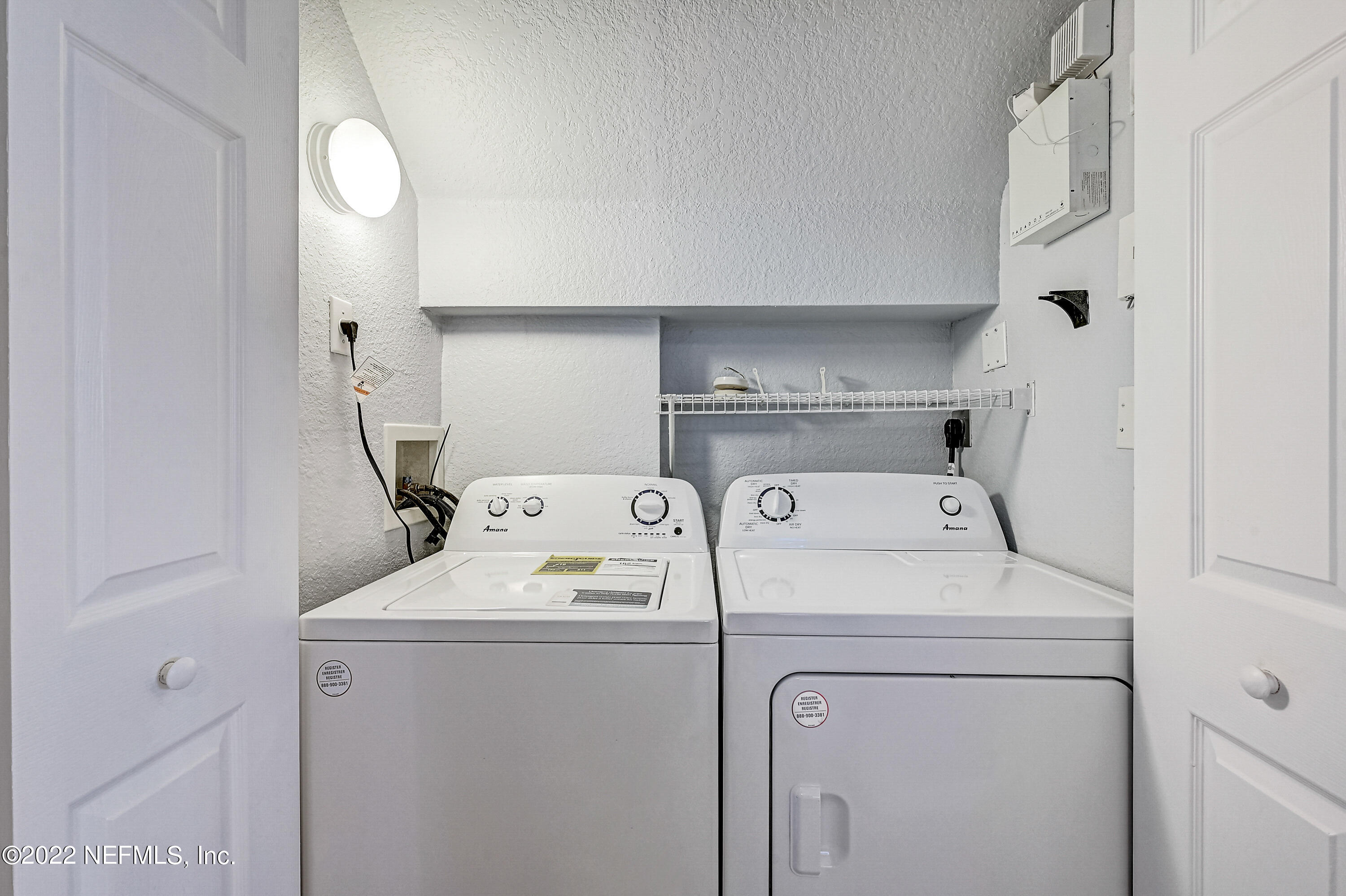 8550 Touchton Road, Unit 1132 Jacksonville, FL 32216 - Photo 21 of 43 a utility room with dryer and washer