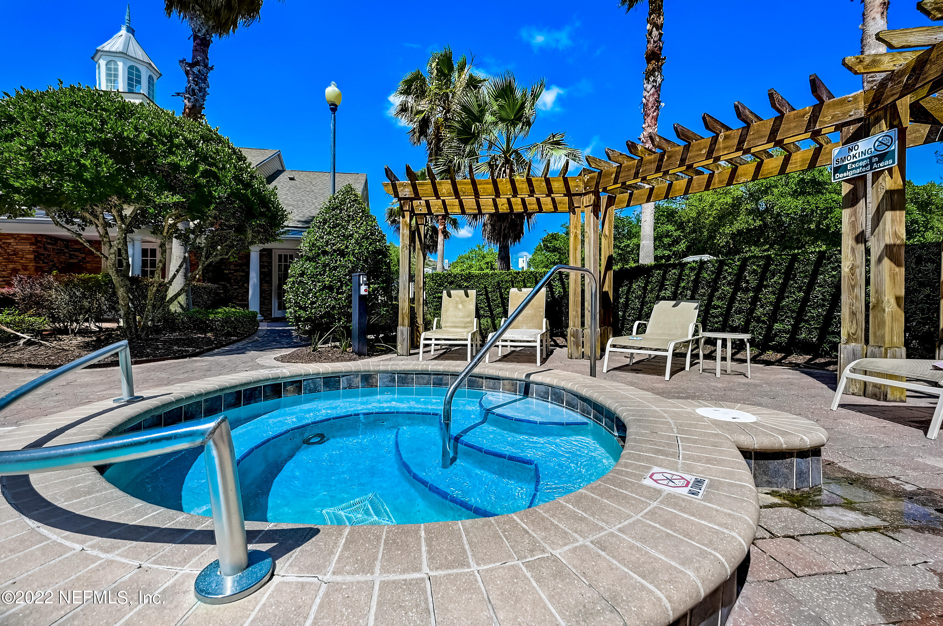 8550 Touchton Road, Unit 1132 Jacksonville, FL 32216 - Photo 25 of 43 a view of a swimming pool with patio
