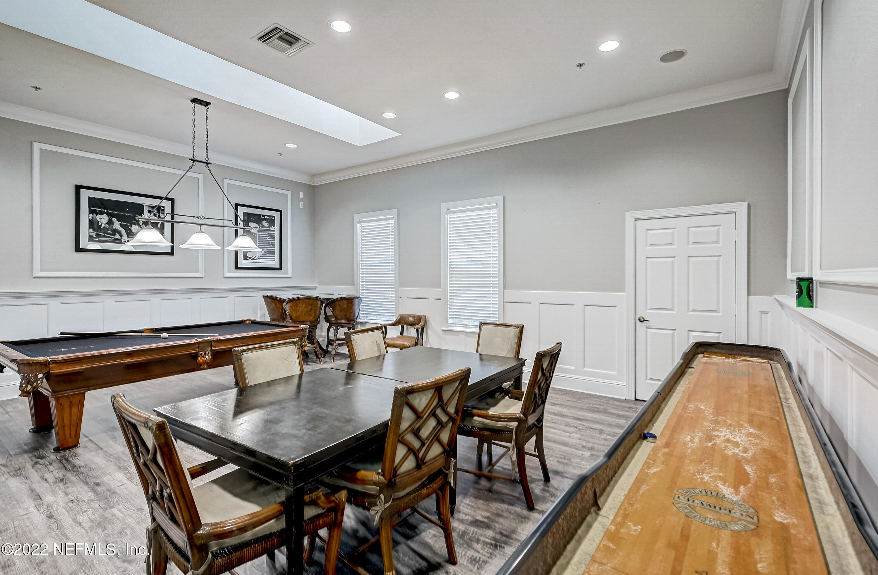 8550 Touchton Road, Unit 1132 Jacksonville, FL 32216 - Photo 35 of 43 a dining room with a table and chairs