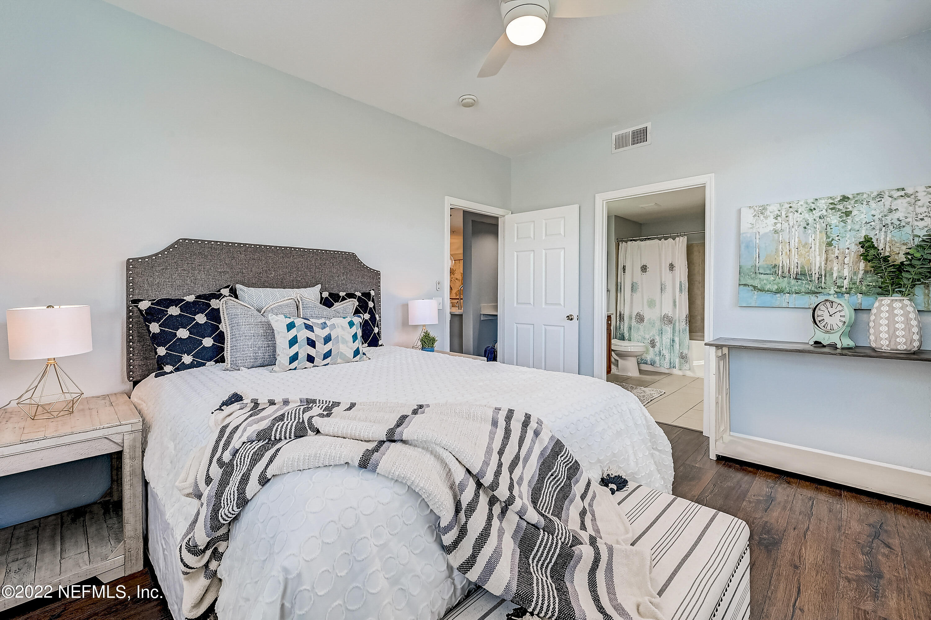 8550 Touchton Road, Unit 1132 Jacksonville, FL 32216 - Photo 9 of 43 a bedroom with a bed and a view of kitchen