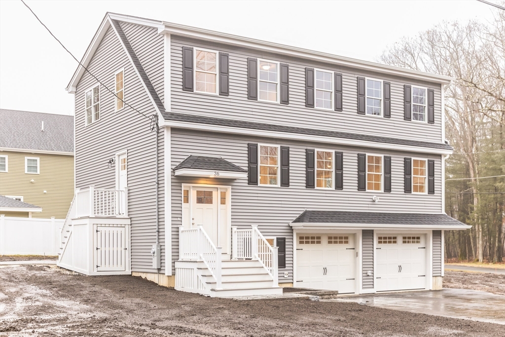 36 Gove Road Billerica, MA 01821 - Photo 2 of 30 a front view of a house with a yard