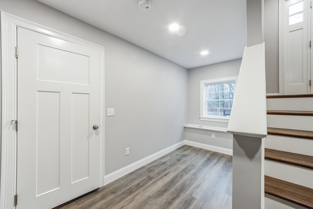 36 Gove Road Billerica, MA 01821 - Photo 28 of 30 a view of empty room with wooden floor and fan