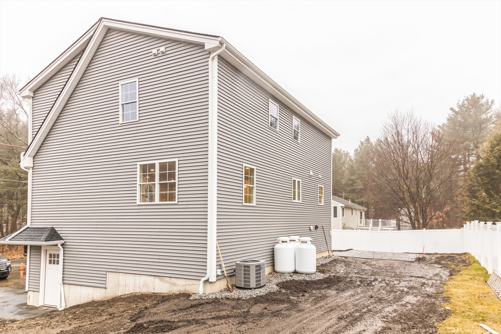 36 Gove Road Billerica, MA 01821 - Photo 29 of 30 a view of a house with snow