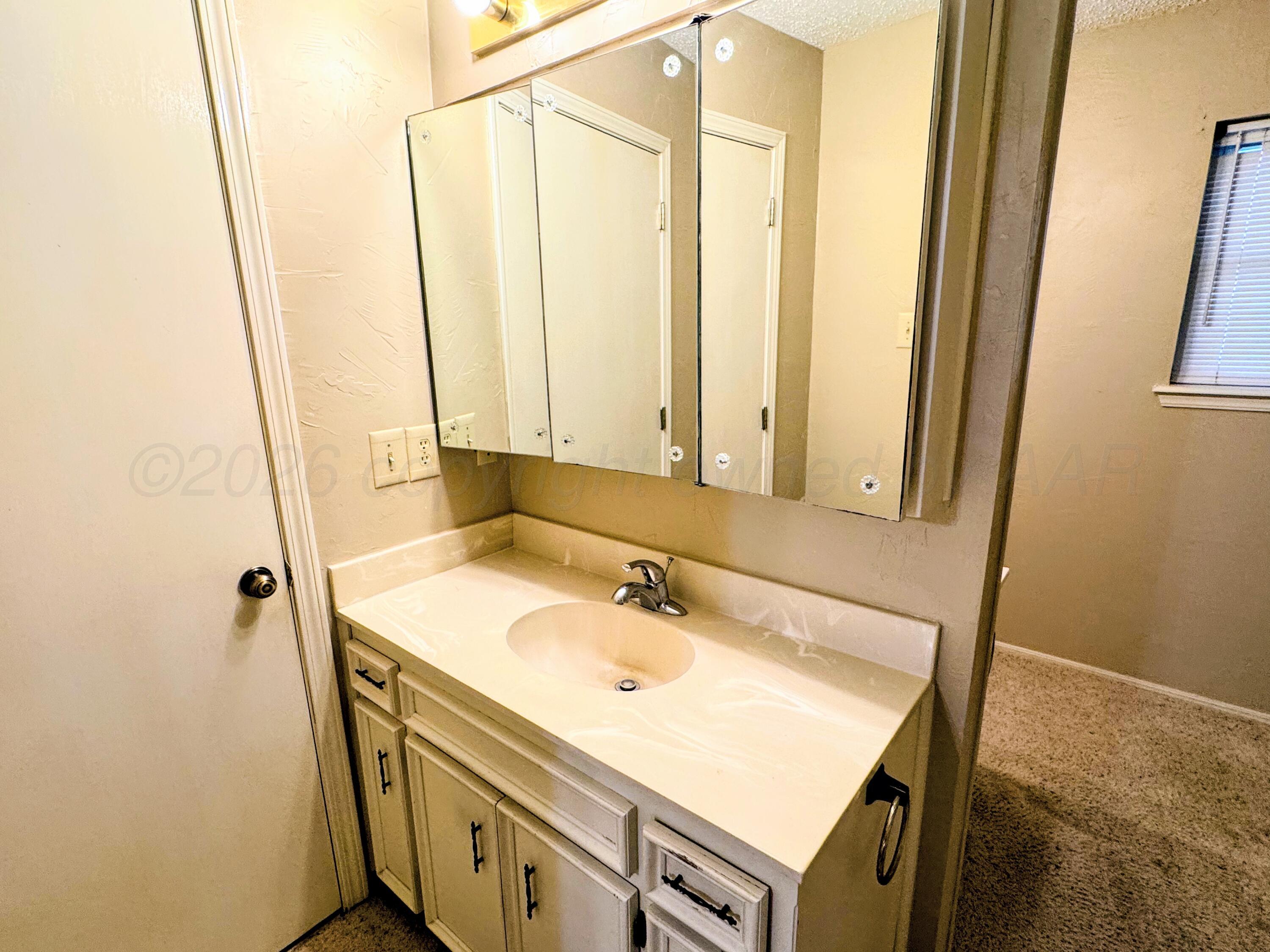 1810 Texas Street Perryton, TX 79070 - Photo 12 of 24 1810 TEXAS PRIMARY BATHROOM