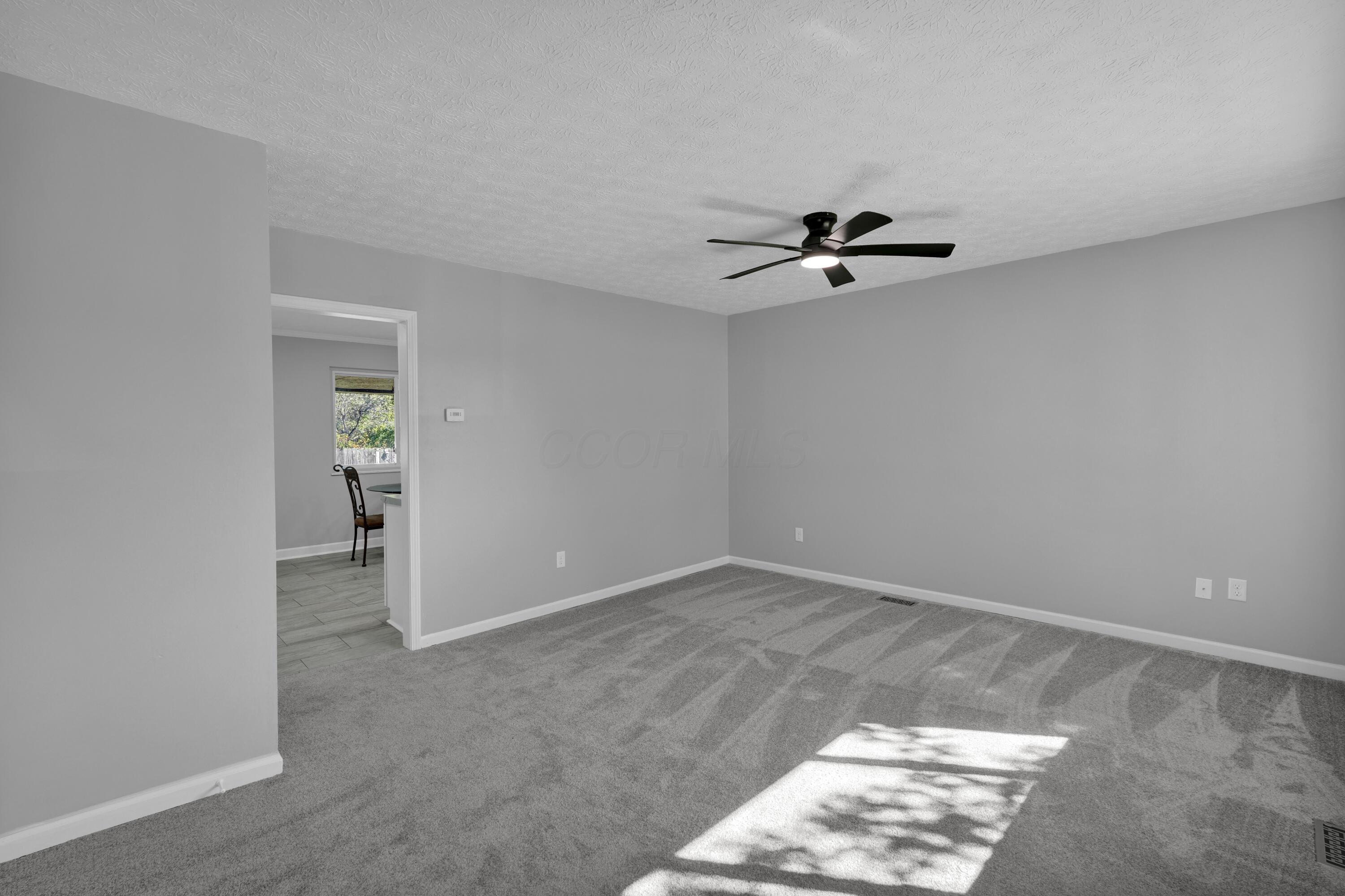 208 Cumberland Road Delaware, OH 43015 - Photo 3 of 37 Upon entry into the home, you'll be greeted by upgraded ceiling fan/light fixture, new flooring, and neutral decor!