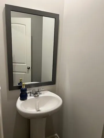 a front view of a house with a garage