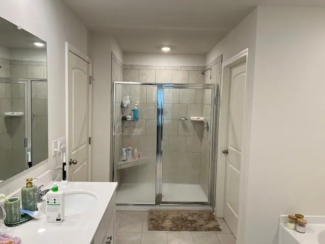a bathroom with a sink and a window