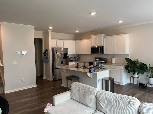 a bathroom with a sink and a window